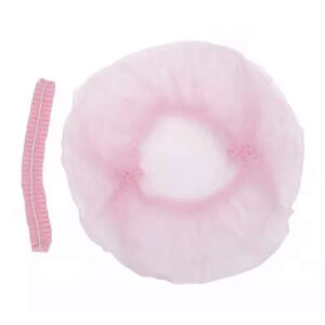Einweg Kopfhaube in rosa für Kosmetikbehandlungen zum schützen der Haare